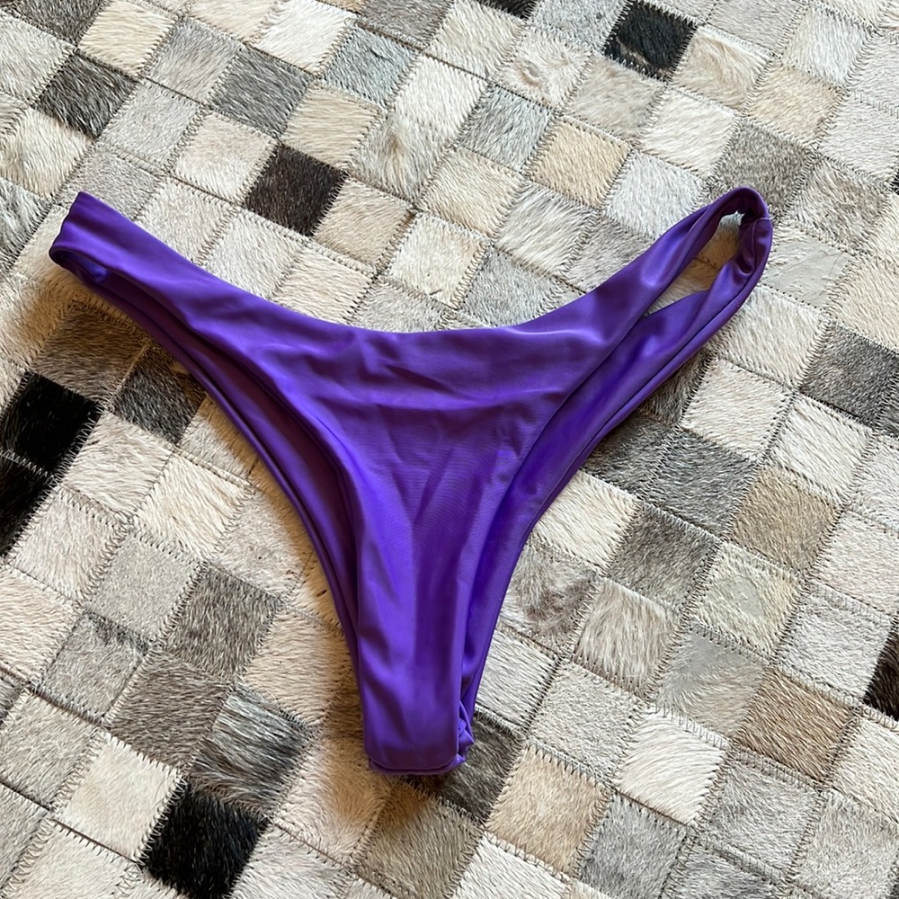 Purple swim shorts, cheeky